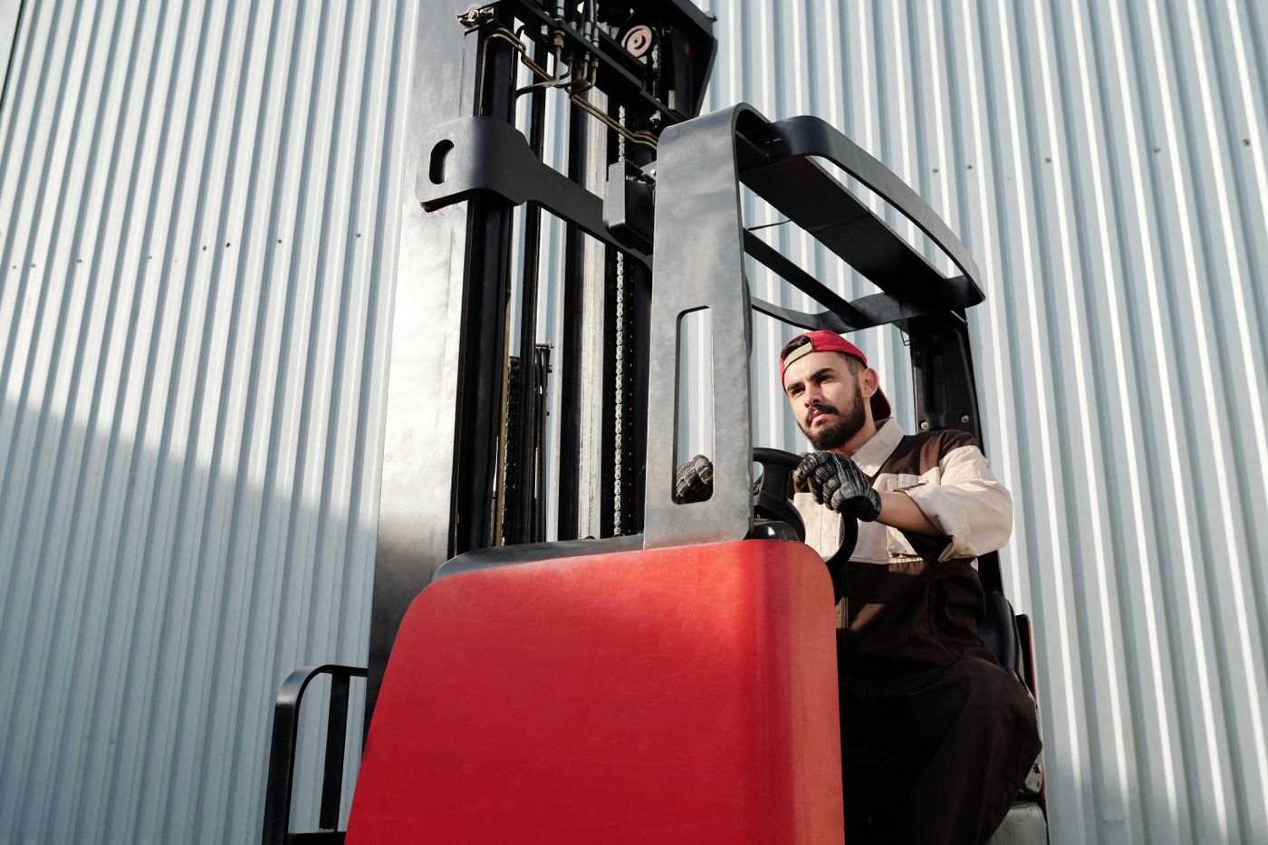 Forklift operator in warehouse